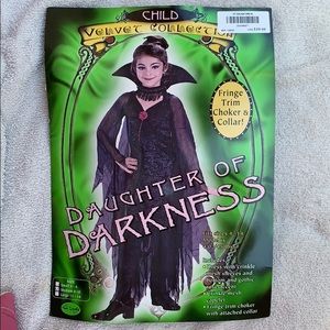 Child Halloween costume. Daughter of Darkness.